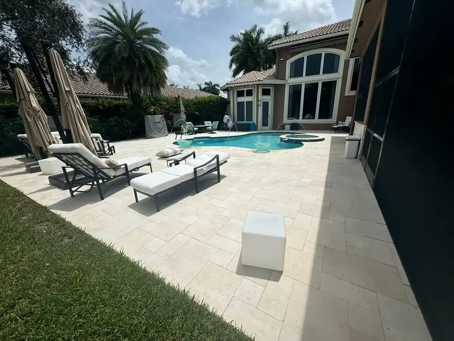 Travertine pool deck renovation by Pavers by Silva